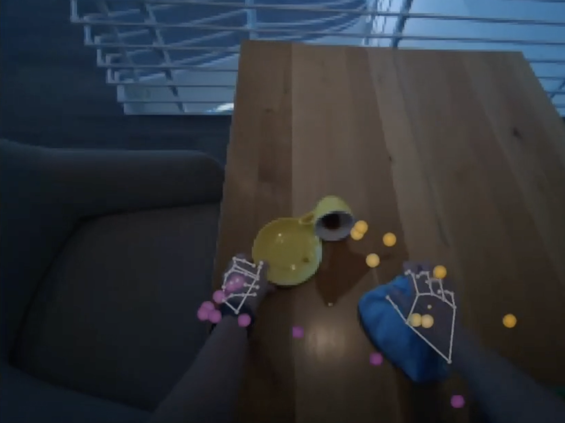 First-person view of a professional demonstrating a cleanup task after a robot failure, with tracked hand landmarks